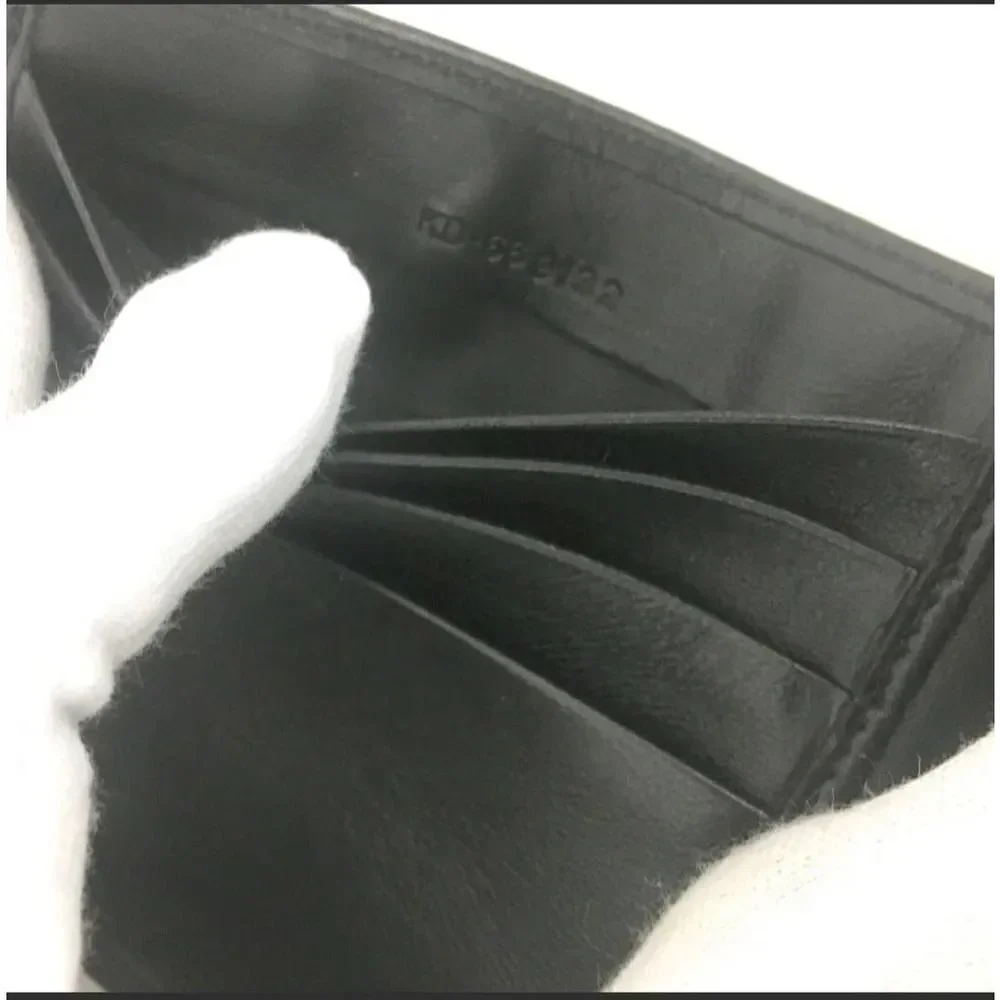 Salvatore Ferragamo Black Leather Bifold Wallet /1A7776. 668132